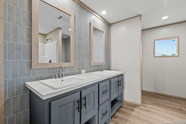 a view of a bathroom from a hallway