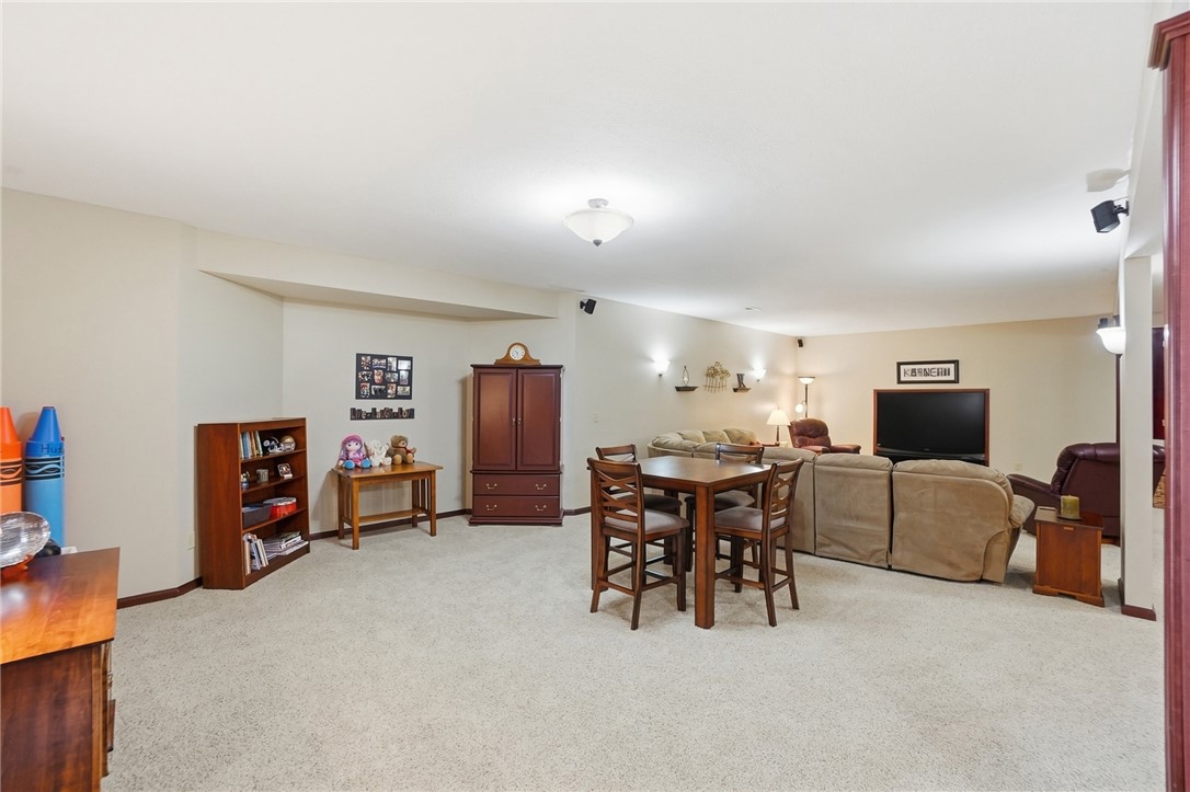710 Governors Road Troy, OH 45373 - Photo 30 of 56 This versatile recreation room offers ample space for various activities, perfect for entertaining.