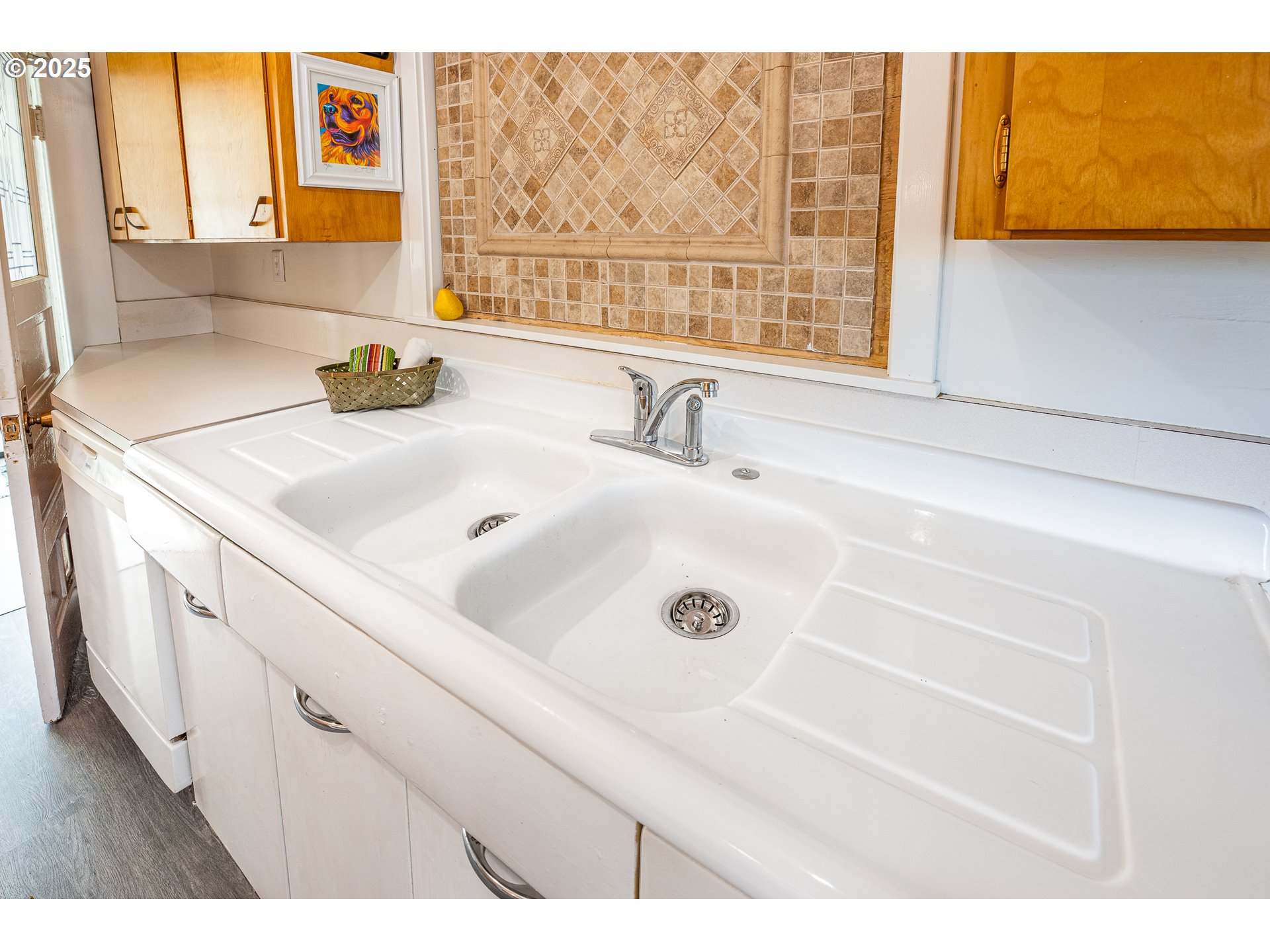 407 Park Street Springfield, OR 97477 - Photo 8 of 37 a bathroom with a sink and a window
