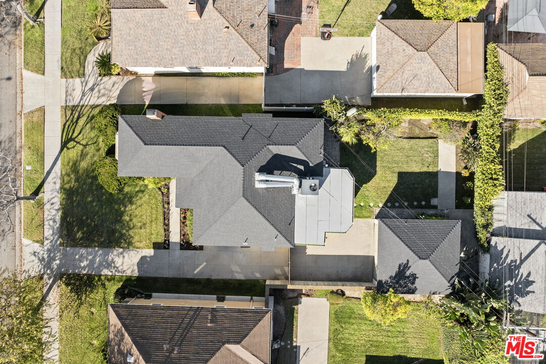 3770 Buckingham Road Los Angeles, CA 90016 - Photo 18 of 19 an aerial view of a house with swimming pool