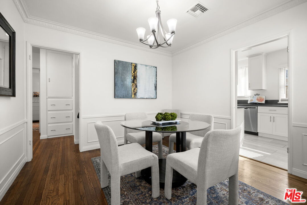 3770 Buckingham Road Los Angeles, CA 90016 - Photo 8 of 19 a view of a dining room with furniture and wooden floor