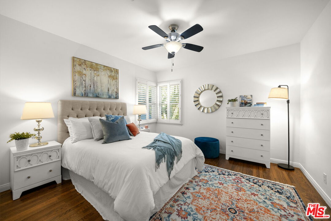 3770 Buckingham Road Los Angeles, CA 90016 - Photo 9 of 19 a bed room with a bed and a window