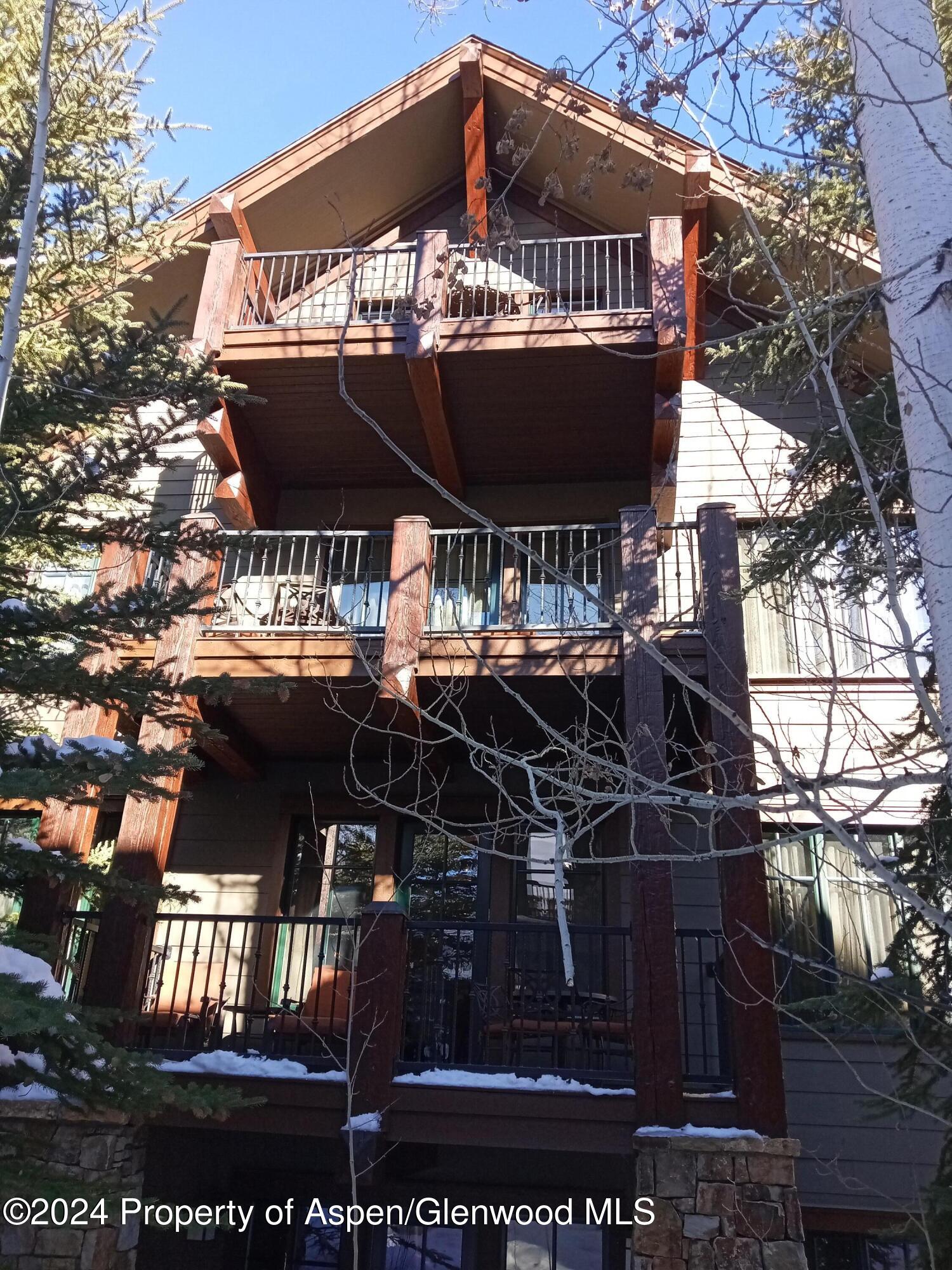 75 Prospector Road, Unit 8206 SUMMER INTEREST 7 Aspen, CO 81611 - Photo 21 of 21 a sign on the side of a building