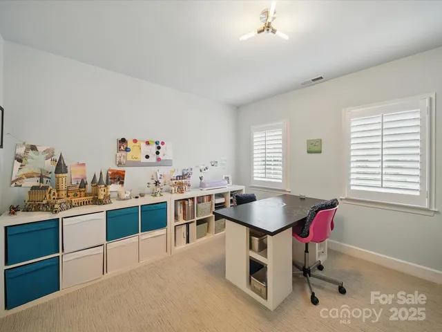 a room with furniture and window