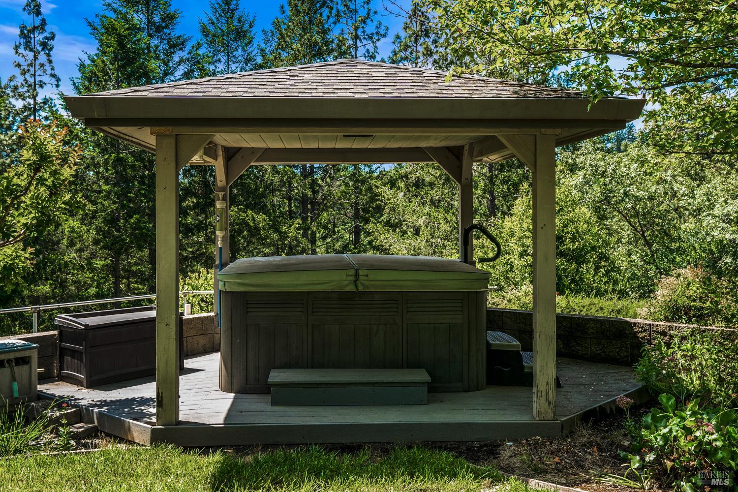 625-629 Hill Road Angwin, CA 94508 - Photo 60 of 64 a view of a wooden deck and a yard