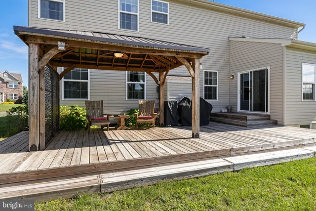 a aerial view of a house with a yard