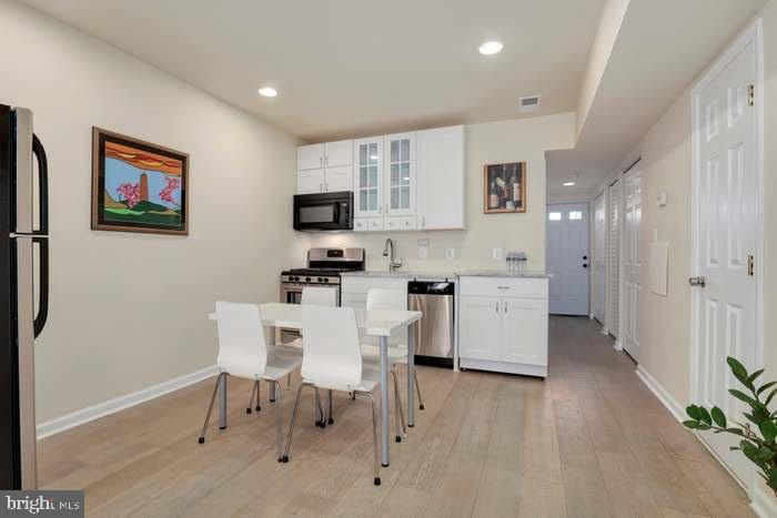 1720 H Street Northeast, Unit A Washington, DC 20002 - Photo 19 of 31 Modern kitchen with sleek design.