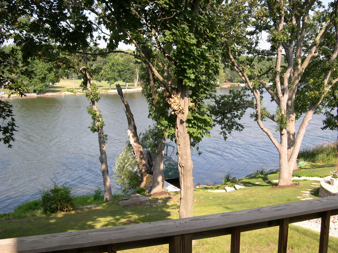 6N284 Riverside Drive St. Charles, IL 60174 - Photo 19 of 26 a view of a yard with large tree