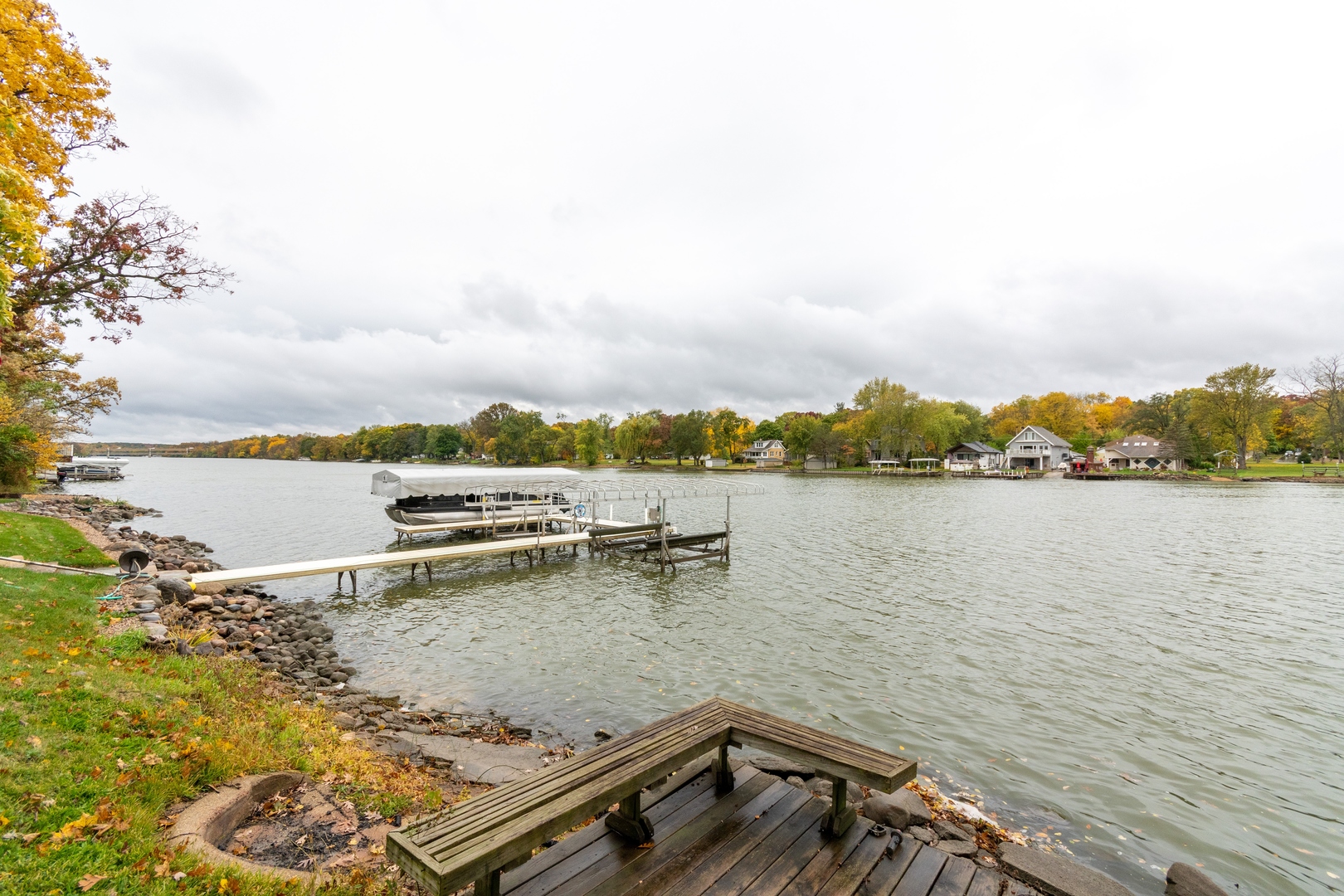 6N284 Riverside Drive St. Charles, IL 60174 - Photo 23 of 26 a view of a lake with houses in the back