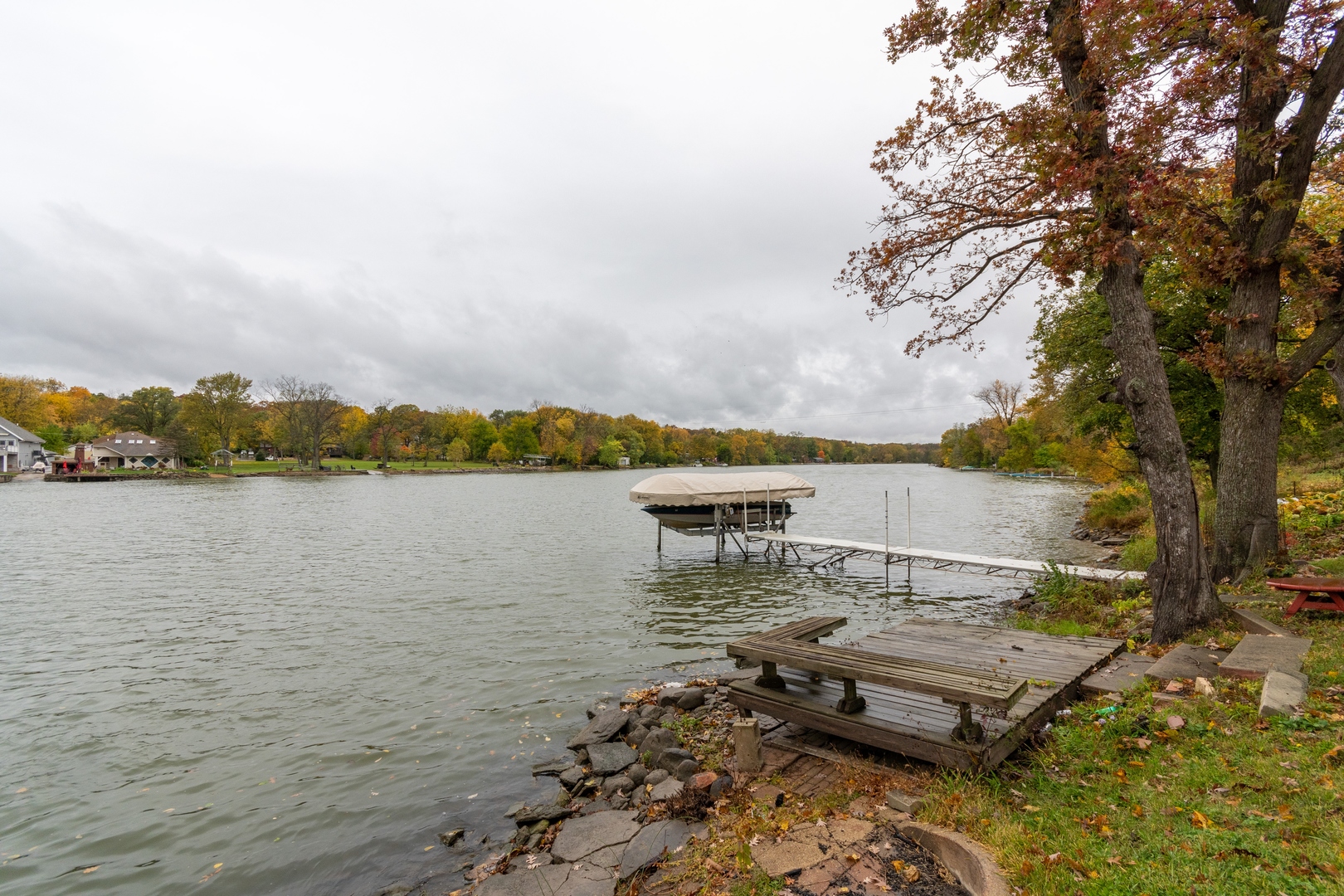 6N284 Riverside Drive St. Charles, IL 60174 - Photo 24 of 26 a view of a lake with houses in the back