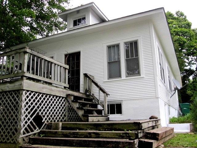 6N284 Riverside Drive St. Charles, IL 60174 - Photo 4 of 26 a view of a house with wooden fence