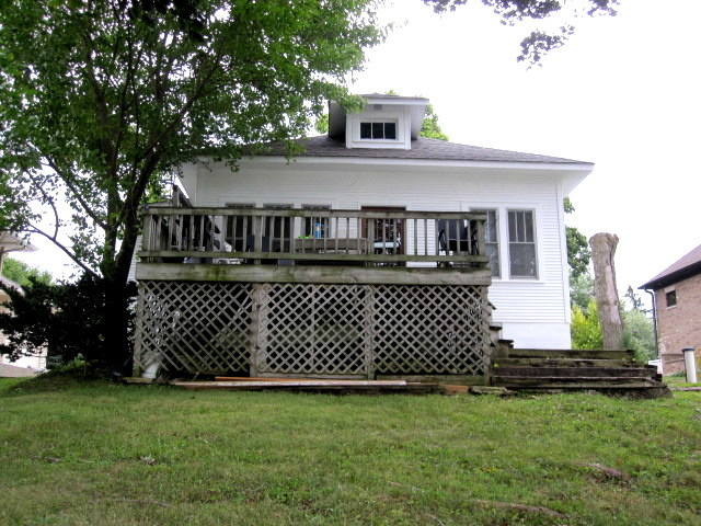 6N284 Riverside Drive St. Charles, IL 60174 - Photo 5 of 26 a front view of a house with a yard