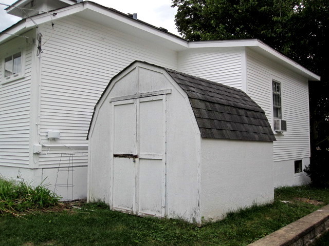 6N284 Riverside Drive St. Charles, IL 60174 - Photo 6 of 26 a view of a wooden door of the house