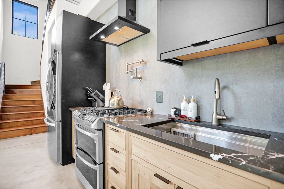 150 Game Trail Road Silverthorne, CO 80498 - Photo 14 of 47 a kitchen with a stove and a sink