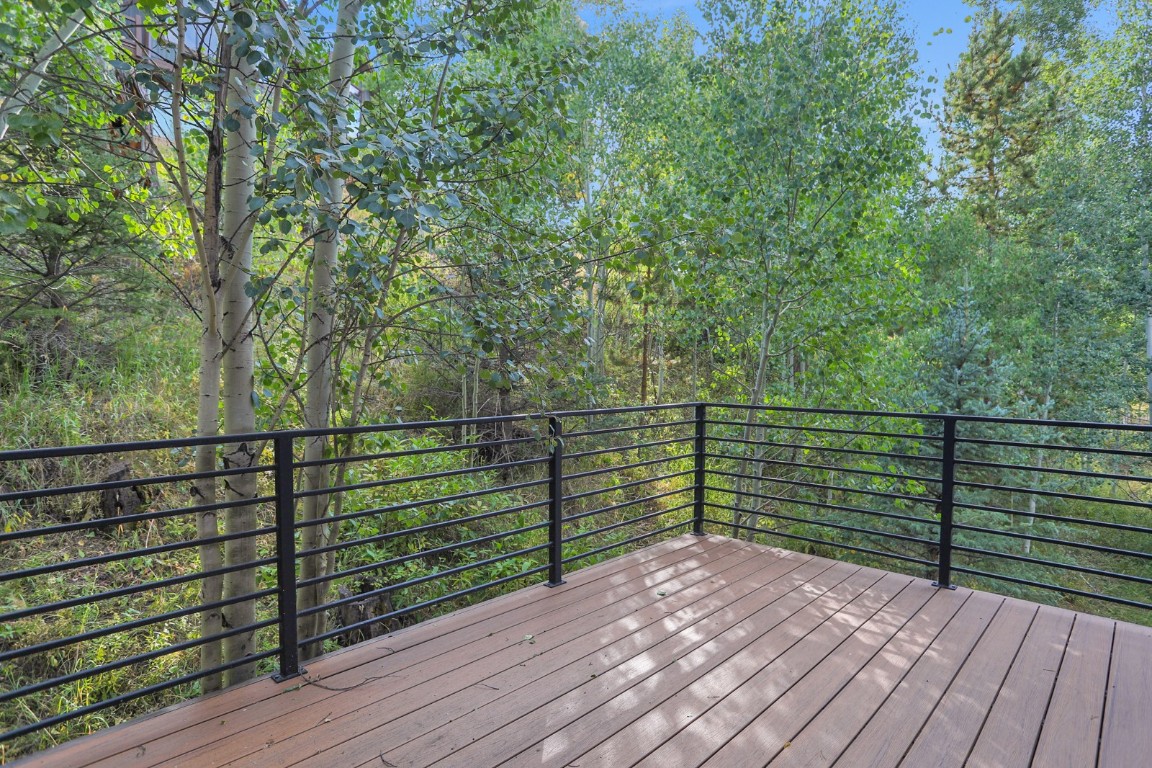 150 Game Trail Road Silverthorne, CO 80498 - Photo 21 of 47 a view of outdoor space with deck and yard