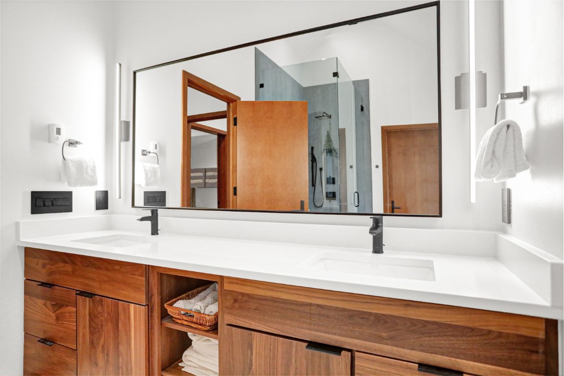 150 Game Trail Road Silverthorne, CO 80498 - Photo 22 of 47 a bathroom with a sink and a mirror