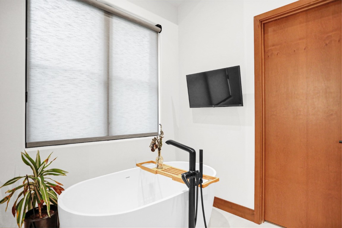 150 Game Trail Road Silverthorne, CO 80498 - Photo 24 of 47 a bathroom with a bathtub and a shower