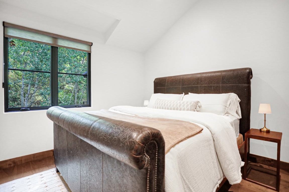 150 Game Trail Road Silverthorne, CO 80498 - Photo 39 of 47 a bedroom with a bed and window