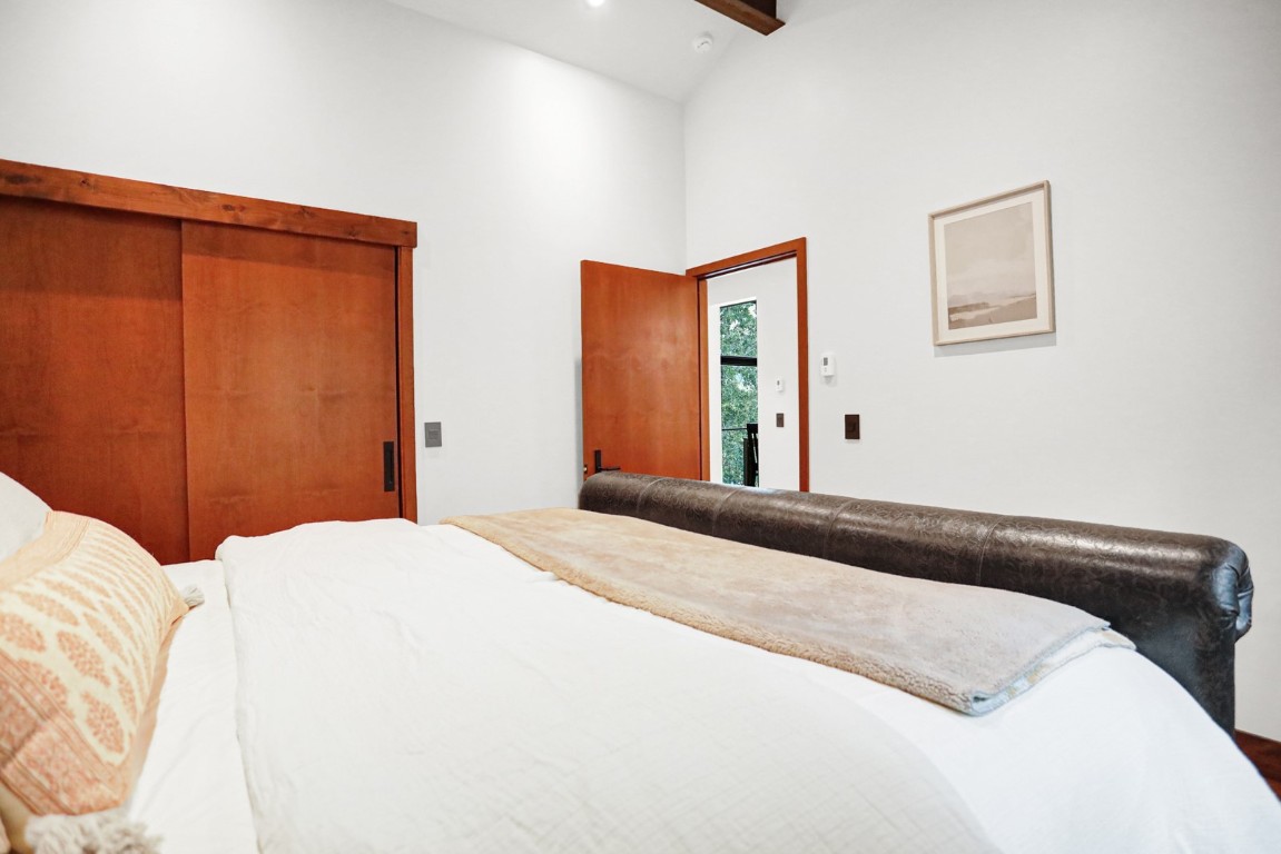 150 Game Trail Road Silverthorne, CO 80498 - Photo 40 of 47 a bedroom with a bed and painting on the wall