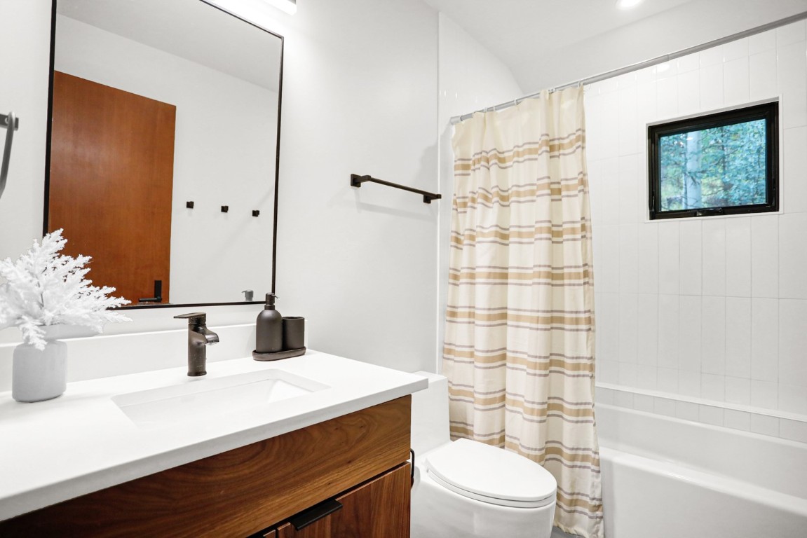 150 Game Trail Road Silverthorne, CO 80498 - Photo 41 of 47 a bathroom with a sink a toilet and shower