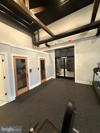 a view of a hallway with an empty room