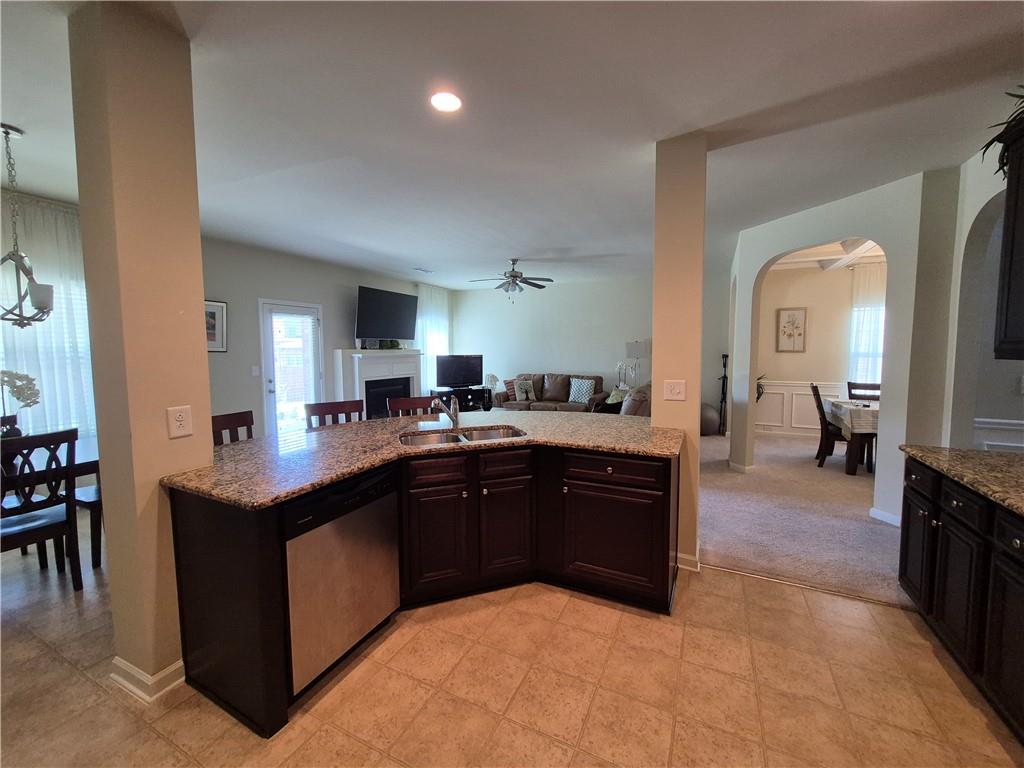 2269 Reddy Farm Lane Grayson, GA 30017 - Photo 21 of 46 a kitchen with sink and cabinets