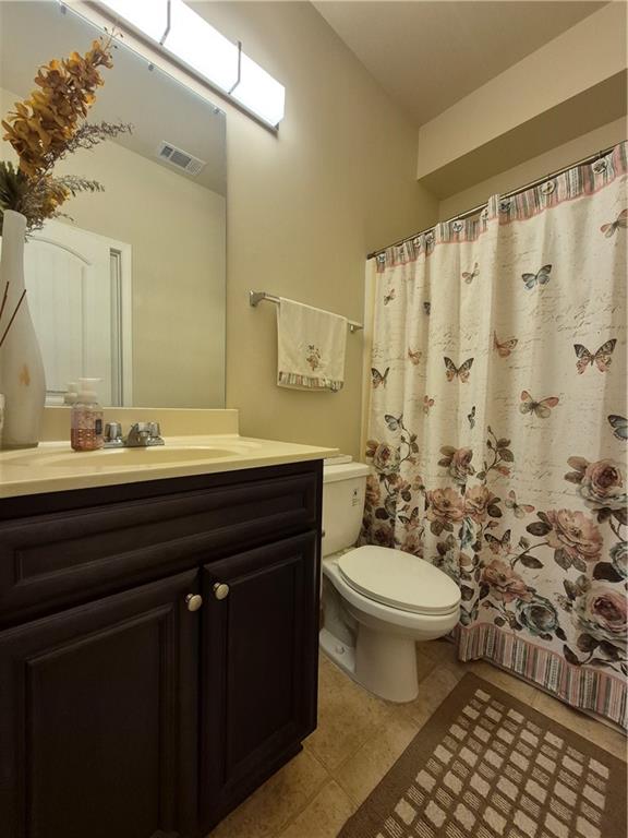 2269 Reddy Farm Lane Grayson, GA 30017 - Photo 27 of 46 a bathroom with a sink and a toilet