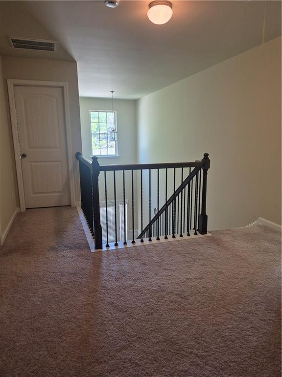 2269 Reddy Farm Lane Grayson, GA 30017 - Photo 29 of 46 a view of a hallway with windows