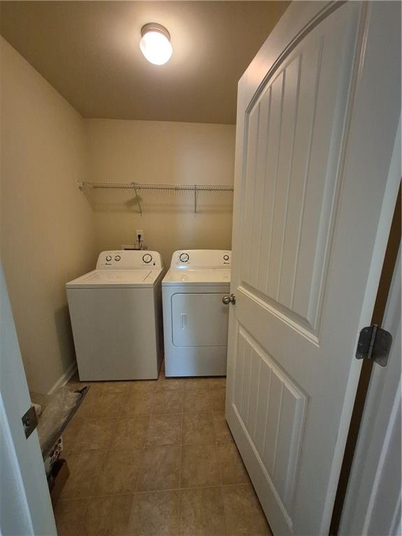 2269 Reddy Farm Lane Grayson, GA 30017 - Photo 30 of 46 a utility room with dryer and washer