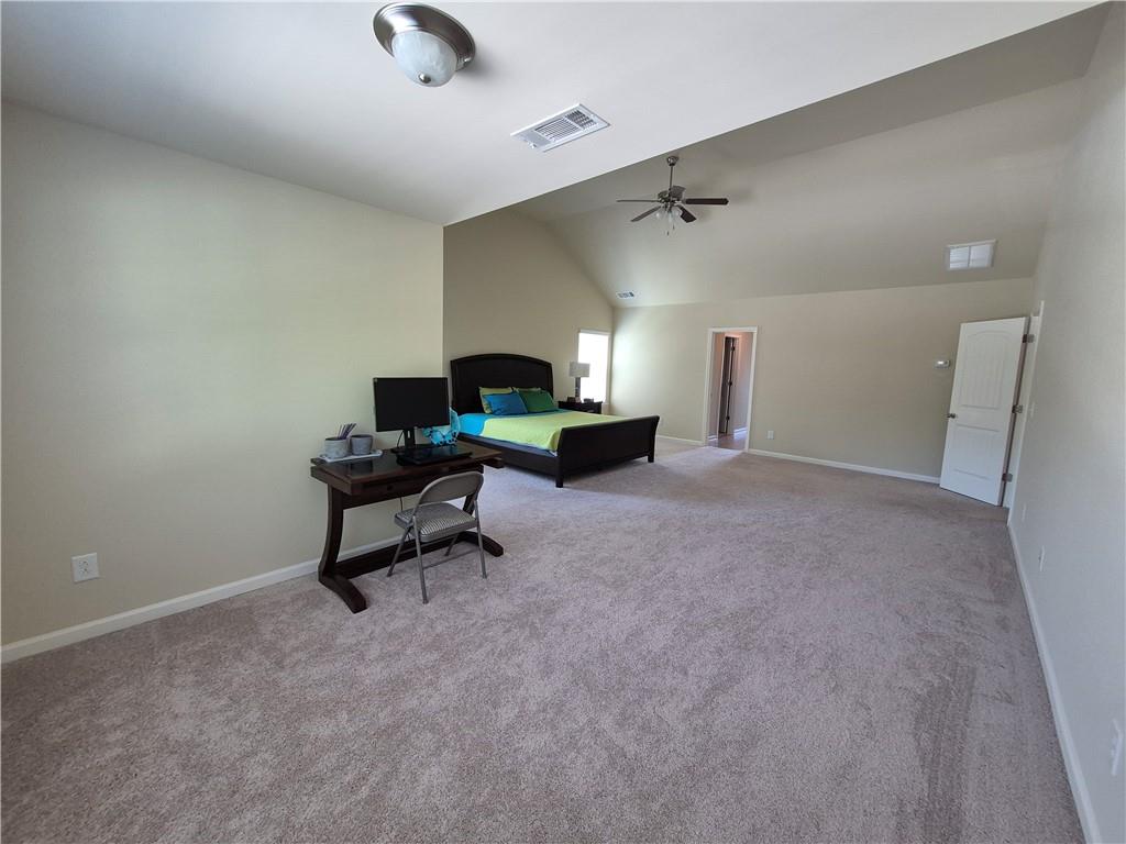 2269 Reddy Farm Lane Grayson, GA 30017 - Photo 36 of 46 a living room with furniture and a table