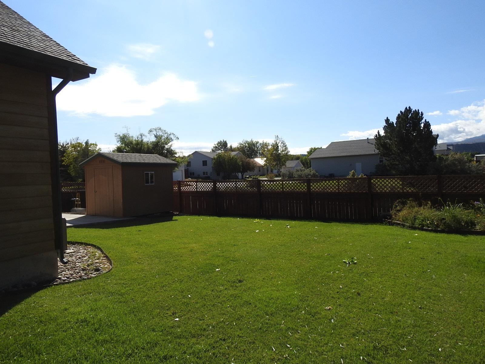 1601 Anvil View Avenue Rifle, CO 81650 - Photo 19 of 35 a view of a backyard with green space
