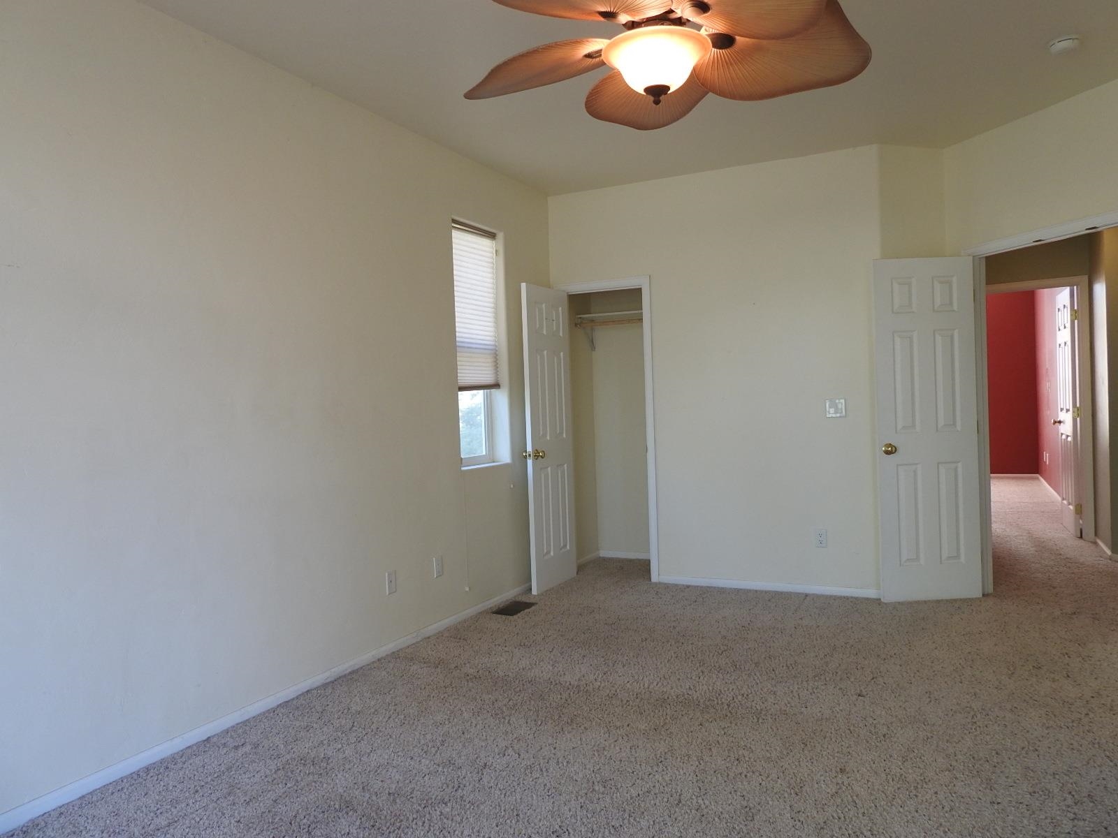 1601 Anvil View Avenue Rifle, CO 81650 - Photo 25 of 35 a view of an empty room with a chandelier fan