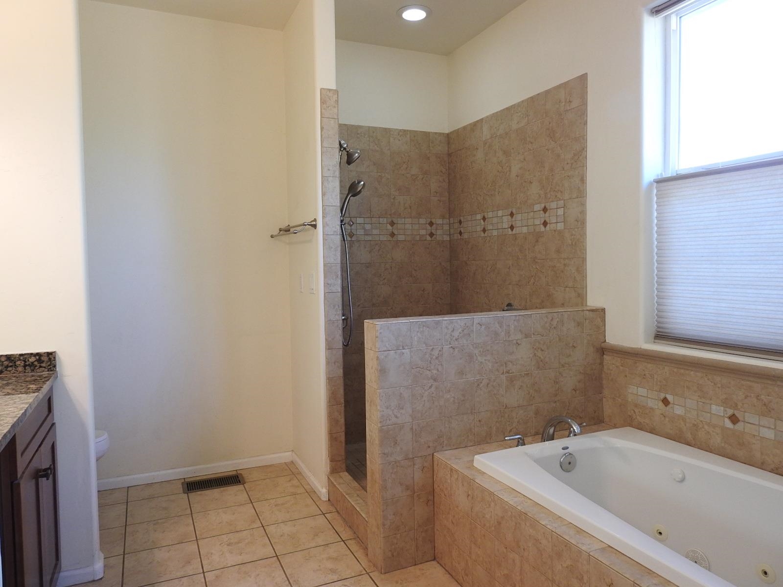 1601 Anvil View Avenue Rifle, CO 81650 - Photo 26 of 35 a bathroom with a bathtub and sink
