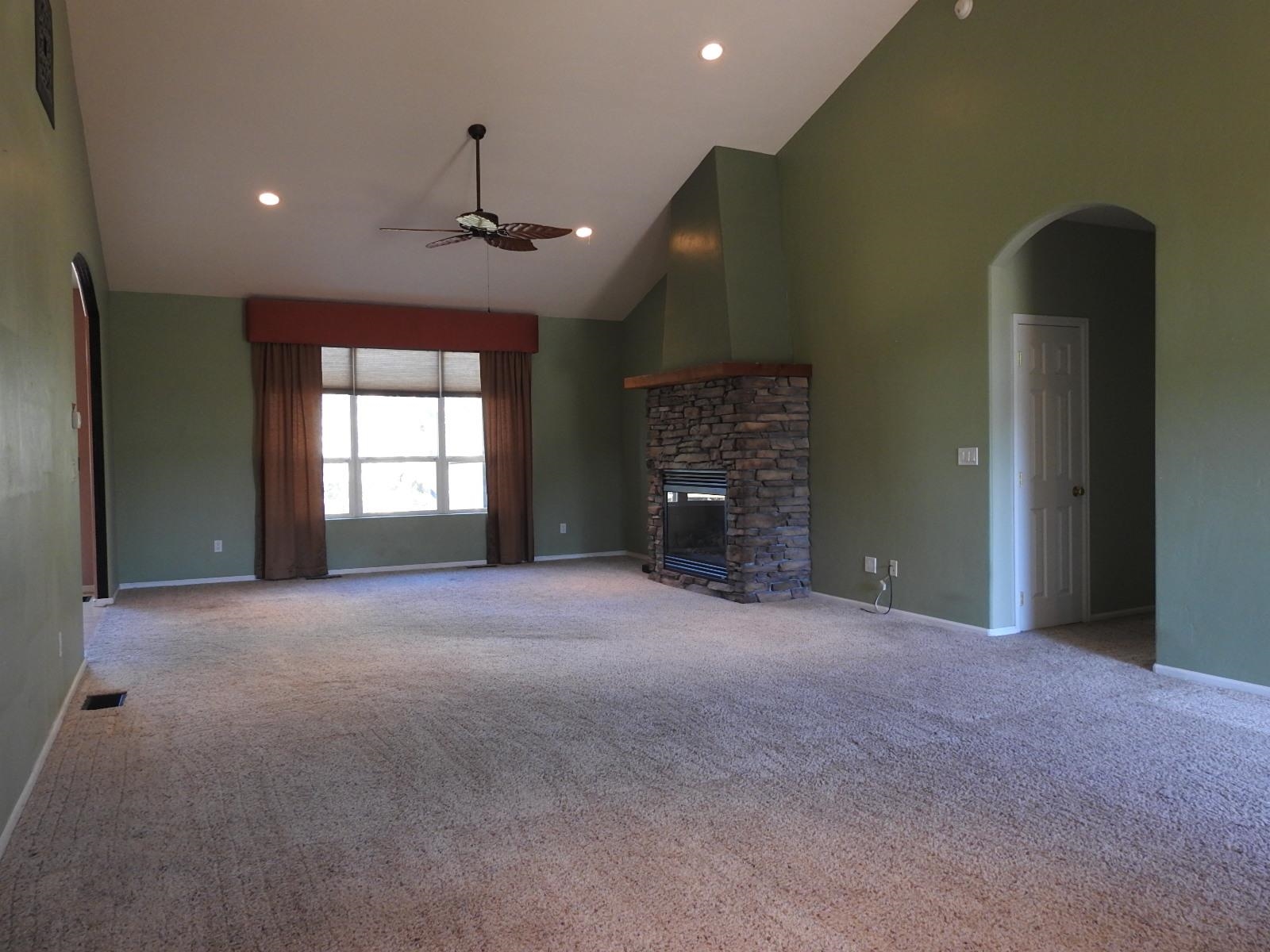 1601 Anvil View Avenue Rifle, CO 81650 - Photo 4 of 35 a view of empty room with a fireplace