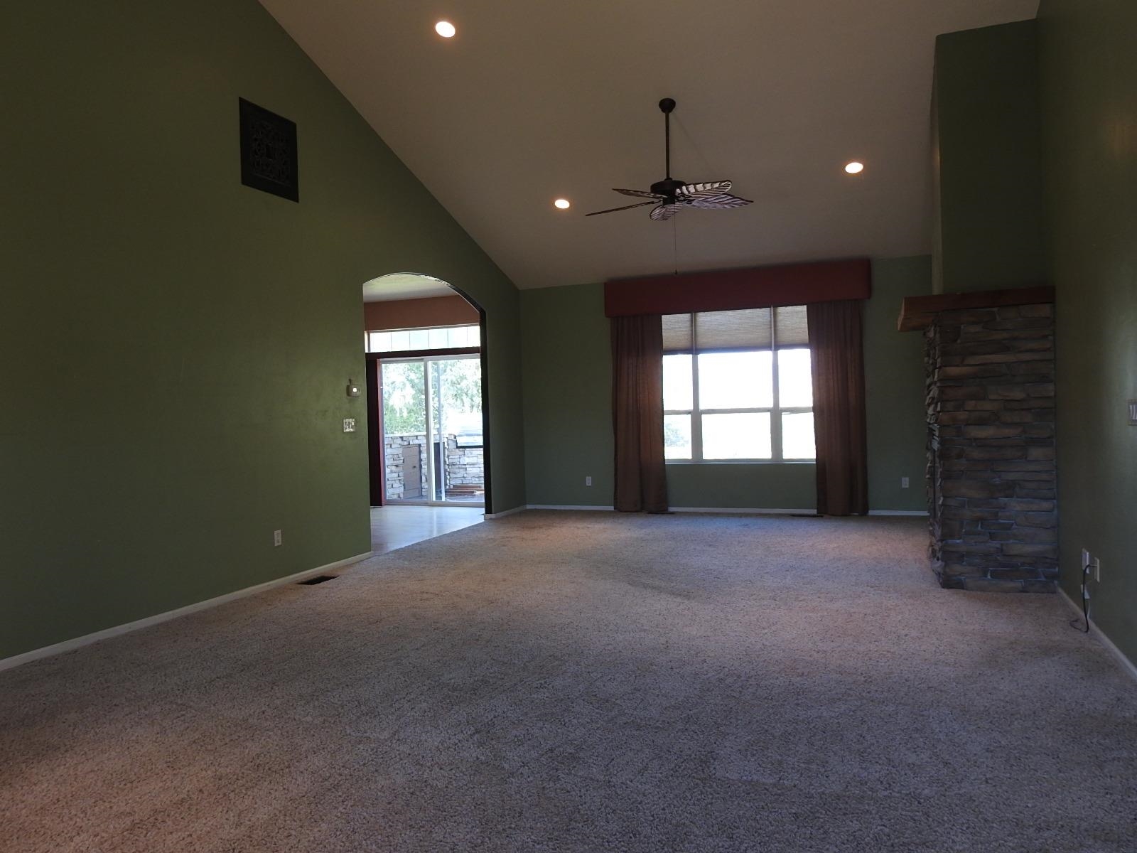 1601 Anvil View Avenue Rifle, CO 81650 - Photo 6 of 35 a view of empty room with a fireplace