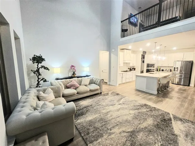 a view of a livingroom with wooden floor