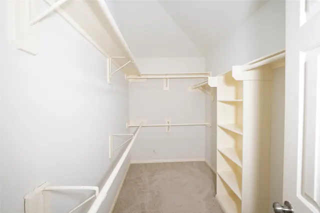 a view of a small yard in front of a house with a small yard