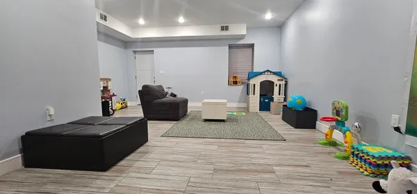 a living room with furniture and a couch