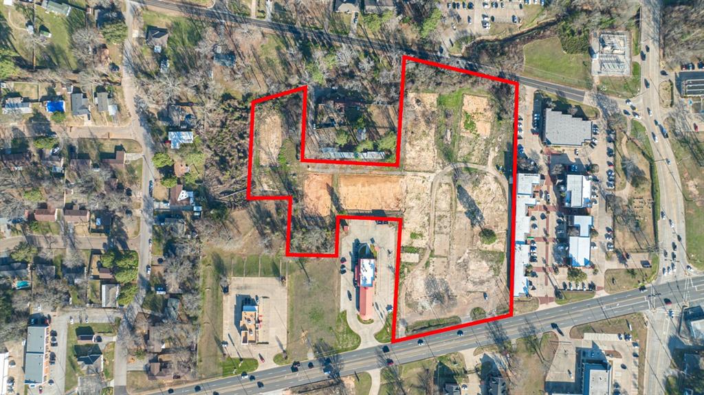 2100 Judson Road Longview, TX 75605 - Photo 12 of 35 a street sign on a wall next to a building