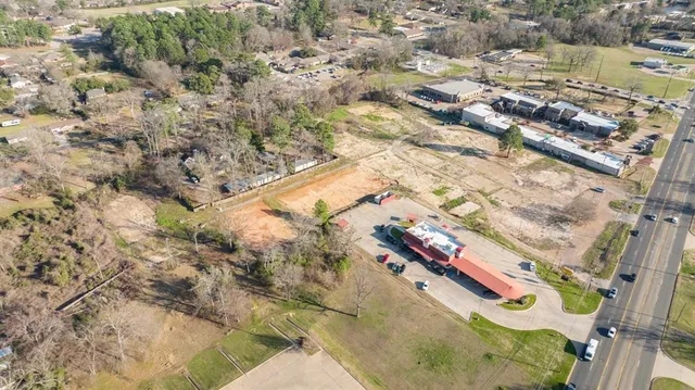 a view of open space with green field