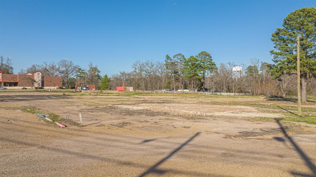 2100 Judson Road Longview, TX 75605 - Photo 24 of 35 a view of grassy field with trees
