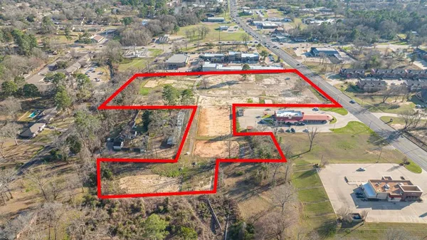 an aerial view of residential house with parking space