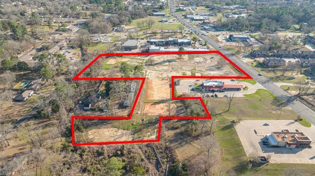 an aerial view of residential house with parking space
