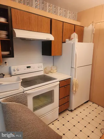 a table and chairs in a room