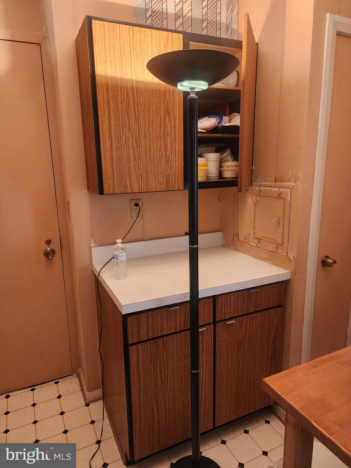 3601 Clarks Lane, Unit 416 Baltimore, MD 21215 - Photo 15 of 68 a bathroom with a sink and a mirror
