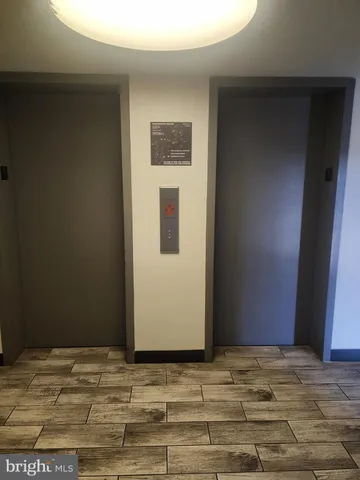 a view of a livingroom with wooden floor