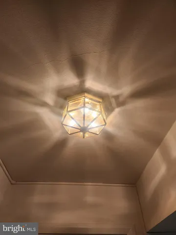 a bathroom with a granite countertop bathtub shower sink and toilet