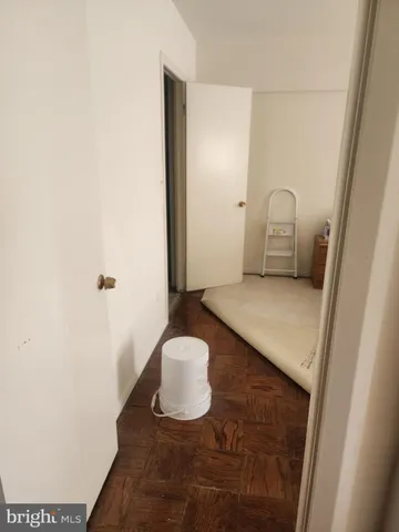 a bathroom with a toilet and a sink