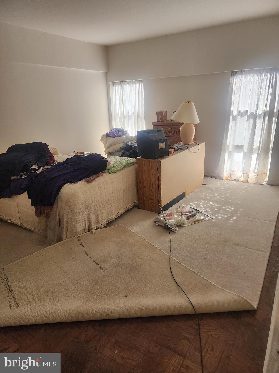 3601 Clarks Lane, Unit 416 Baltimore, MD 21215 - Photo 40 of 68 a living room with furniture and window