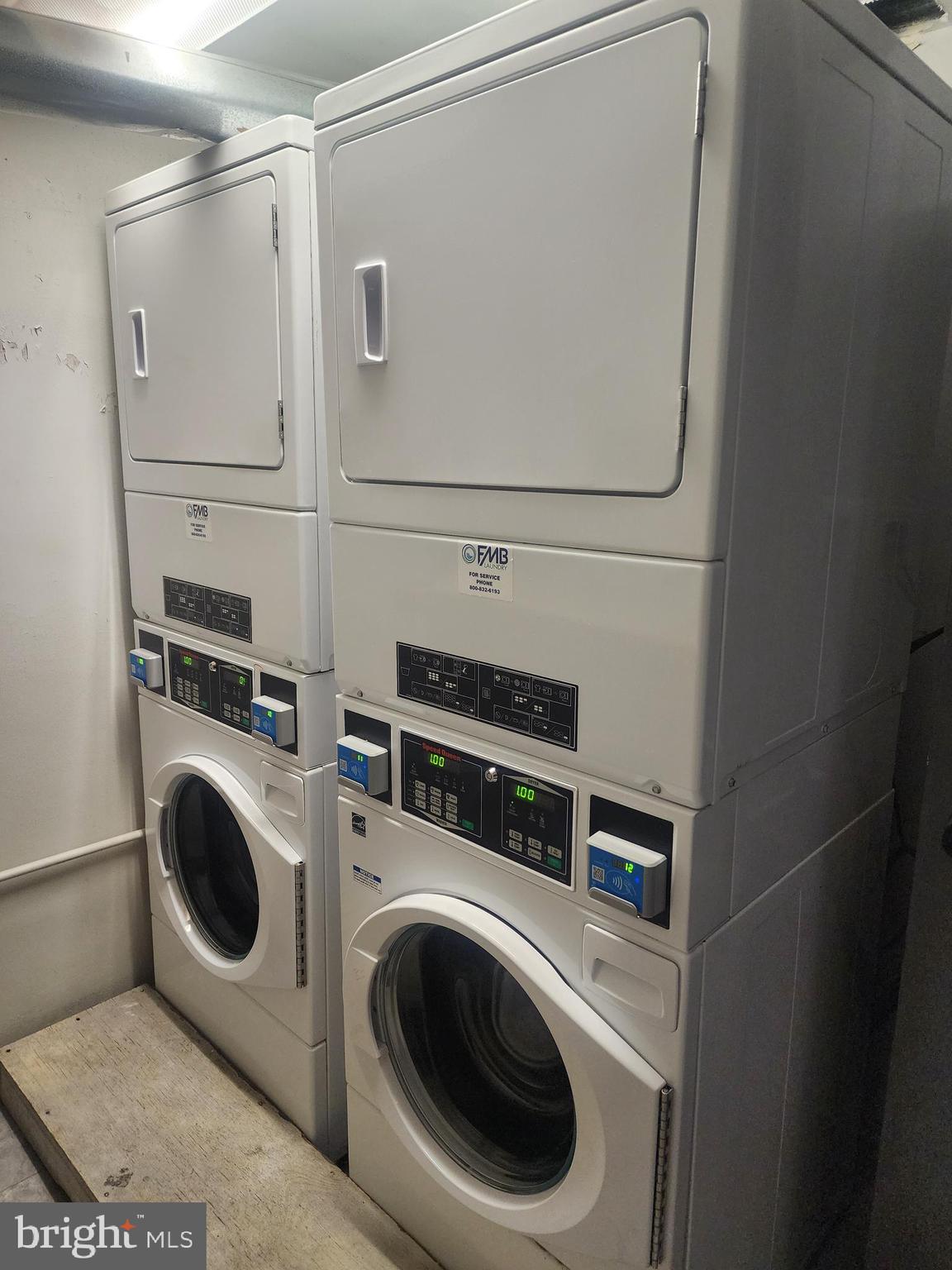 3601 Clarks Lane, Unit 416 Baltimore, MD 21215 - Photo 4 of 68 a utility room with dryer and washer